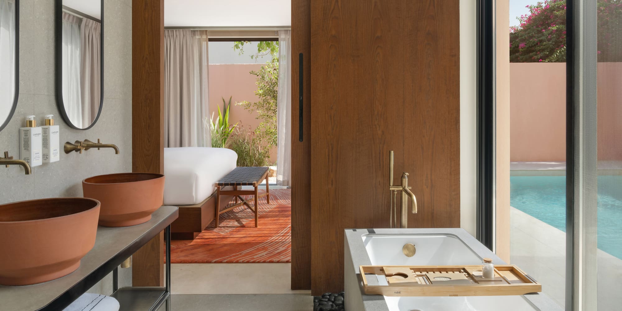 a bathroom with a pool and a sink