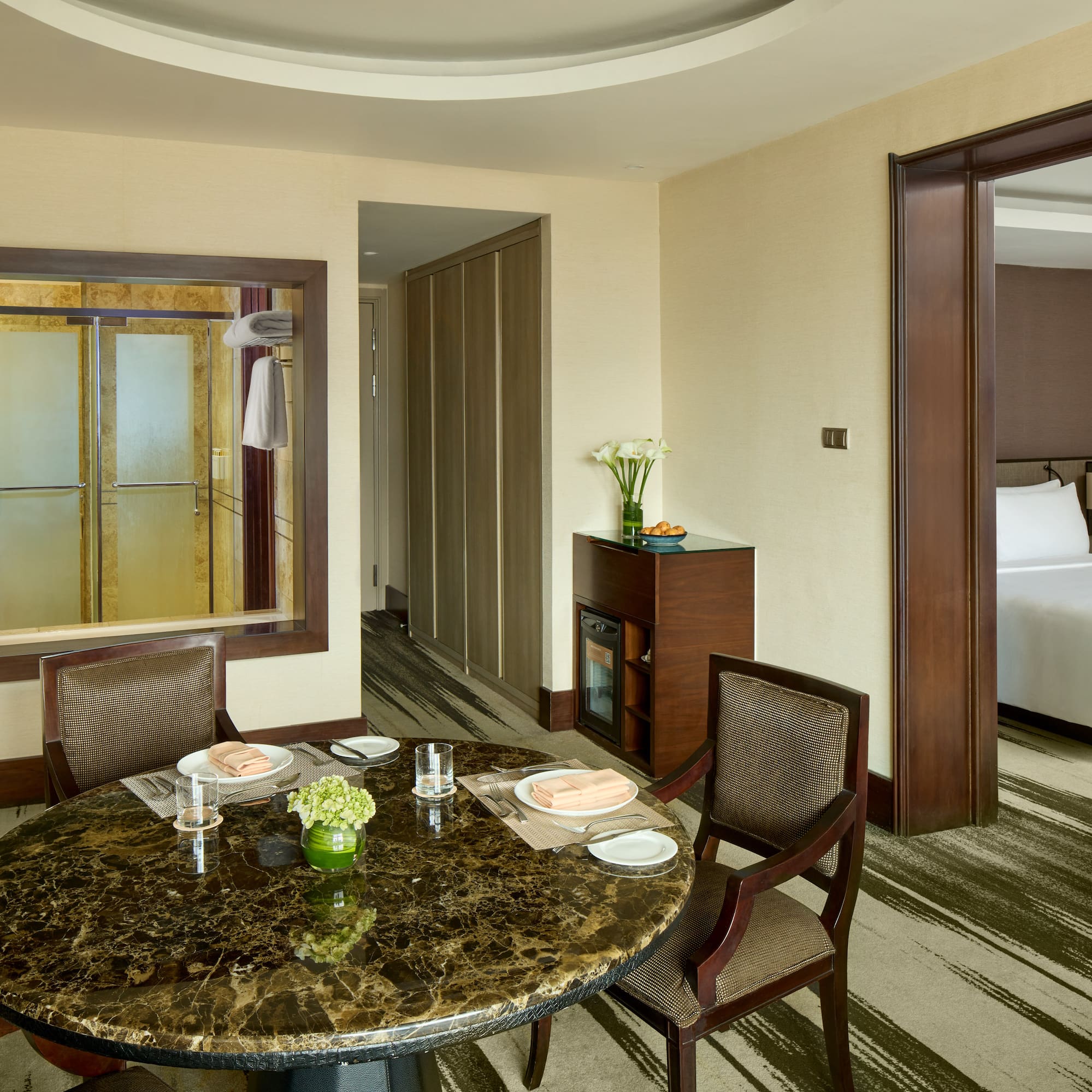 a room with a table and chairs