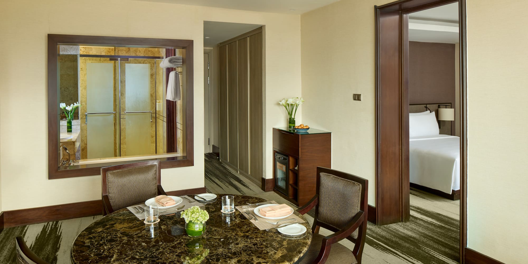 a room with a table and chairs