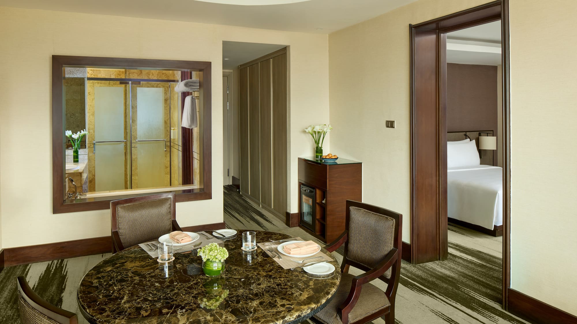 a room with a table and chairs