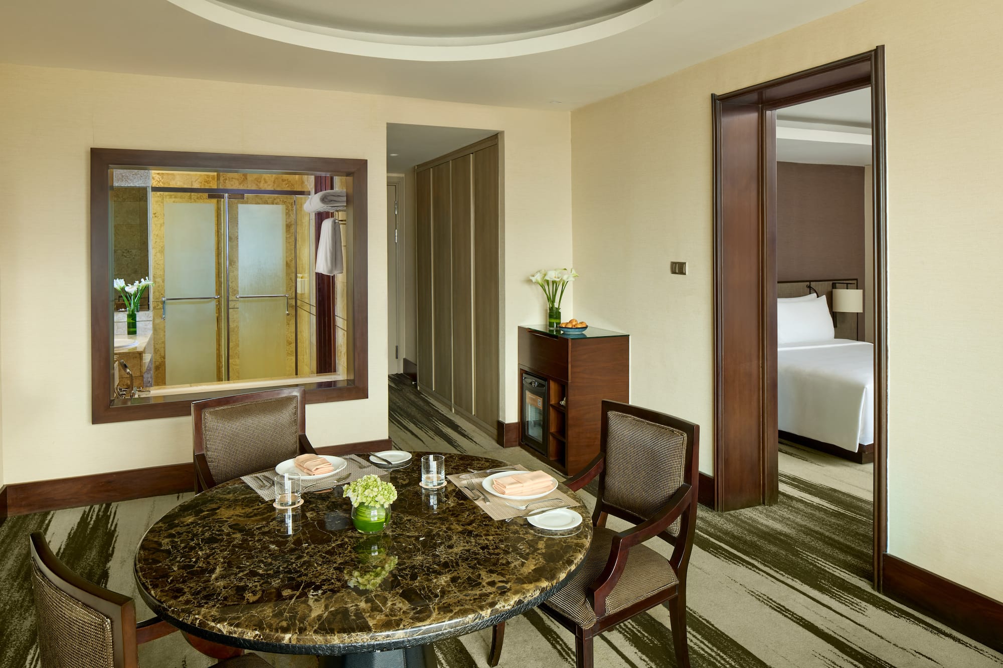 a room with a table and chairs