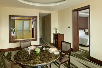 a room with a table and chairs