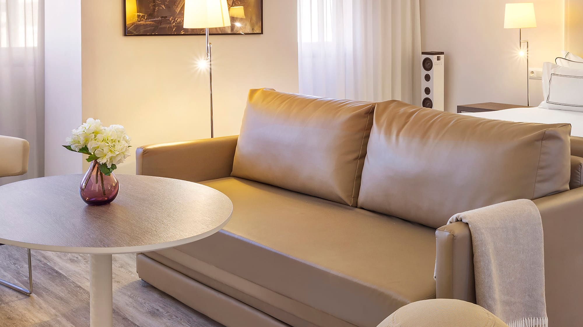 a living room with a couch and a table