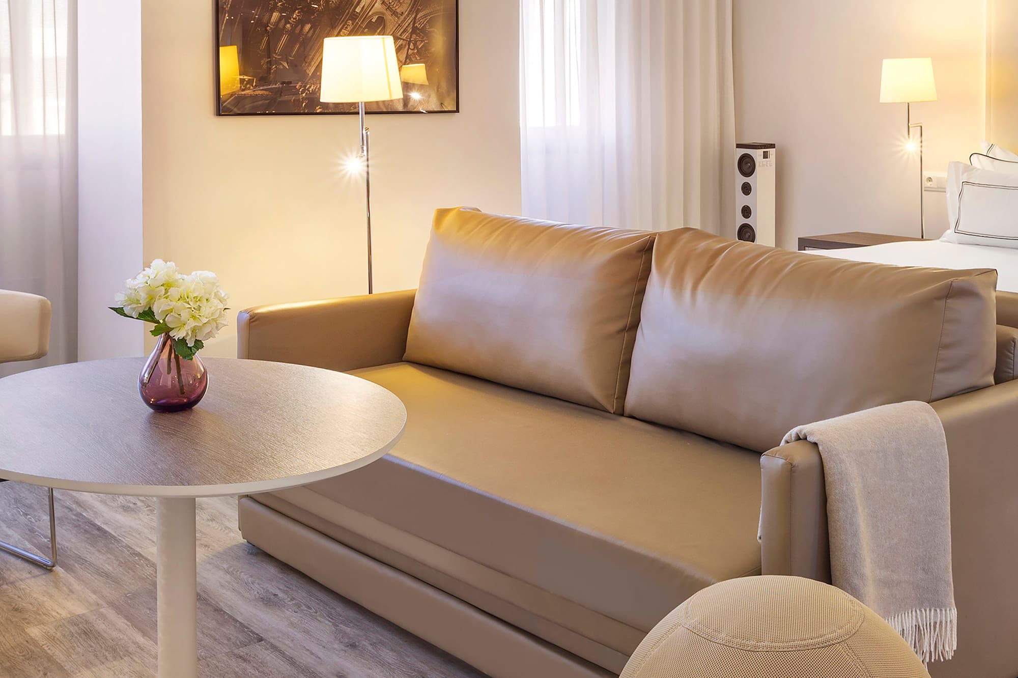 a living room with a couch and a table