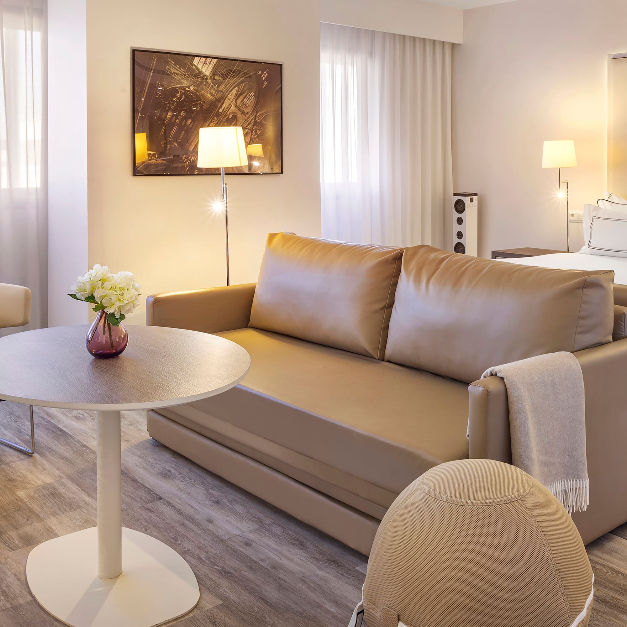 a living room with a couch and a table