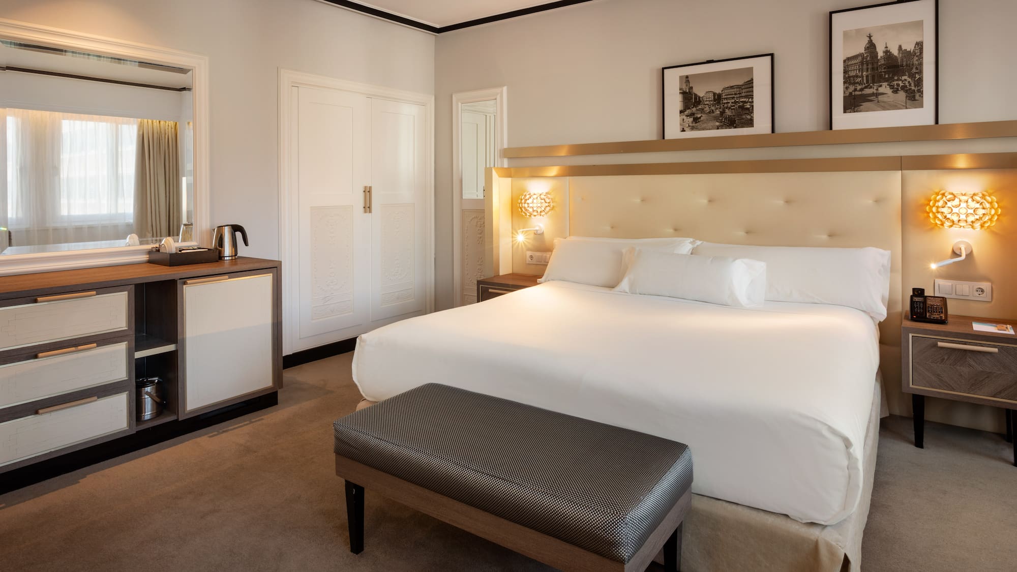 a bedroom with a bed and a mirror