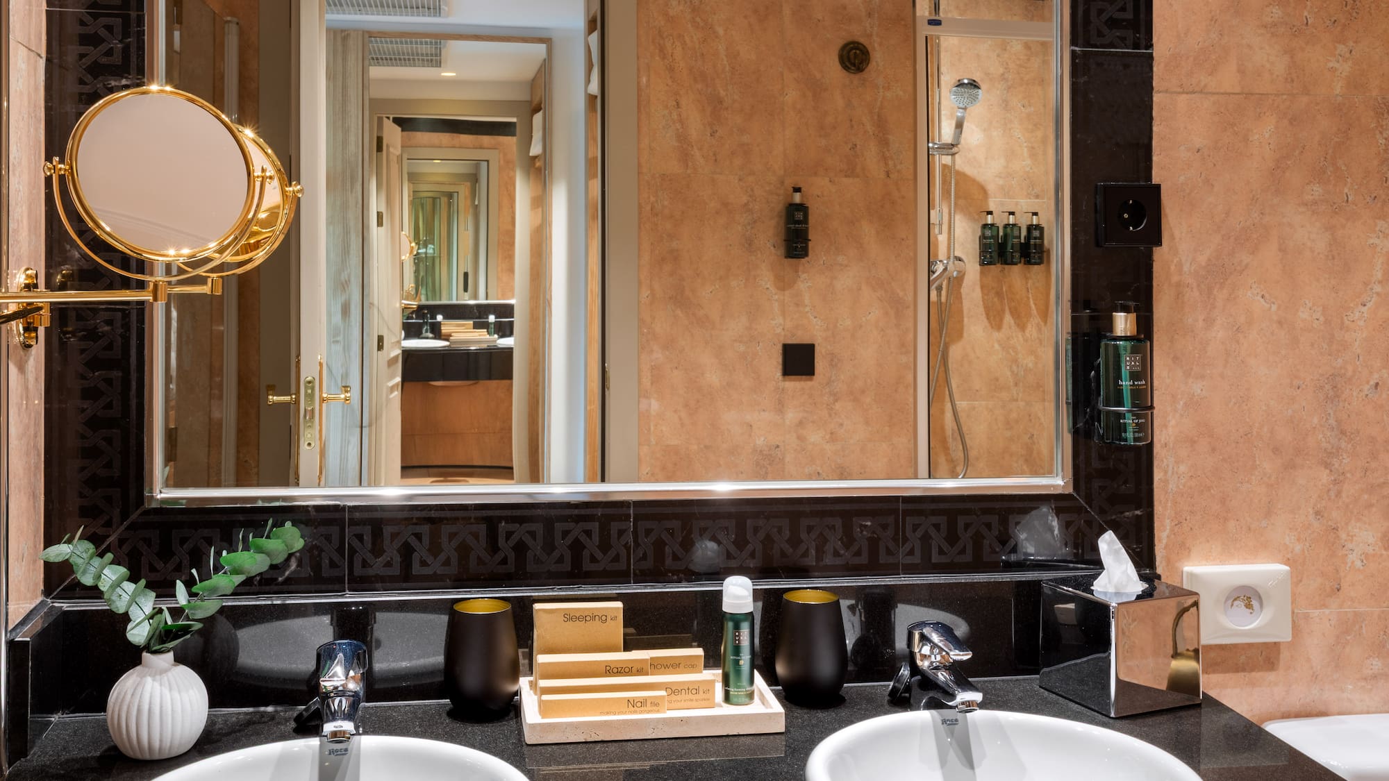 a bathroom with a mirror and sinks