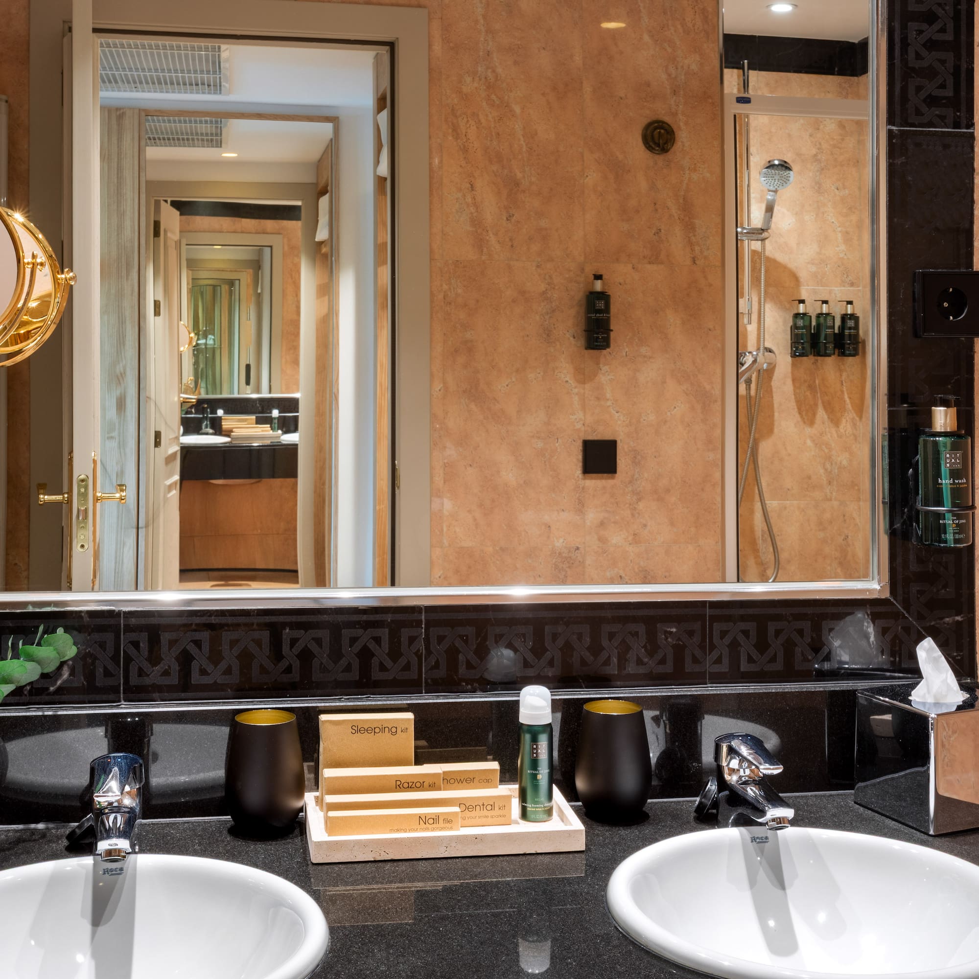 a bathroom with a mirror and sinks