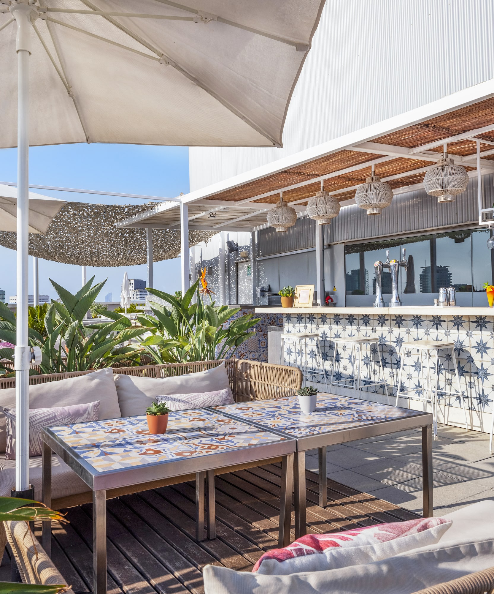 a patio with a table and chairs