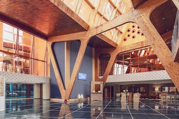 a large room with a large ceiling and a large window