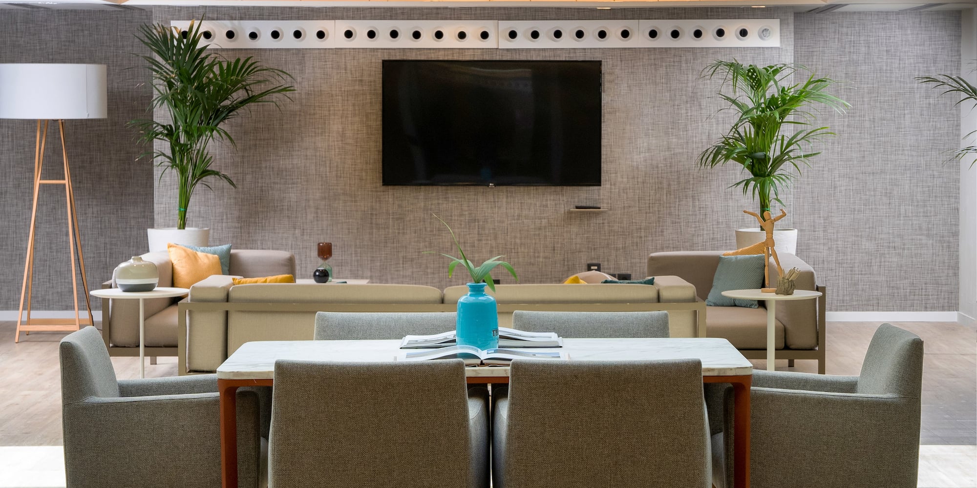 a room with a television and a table