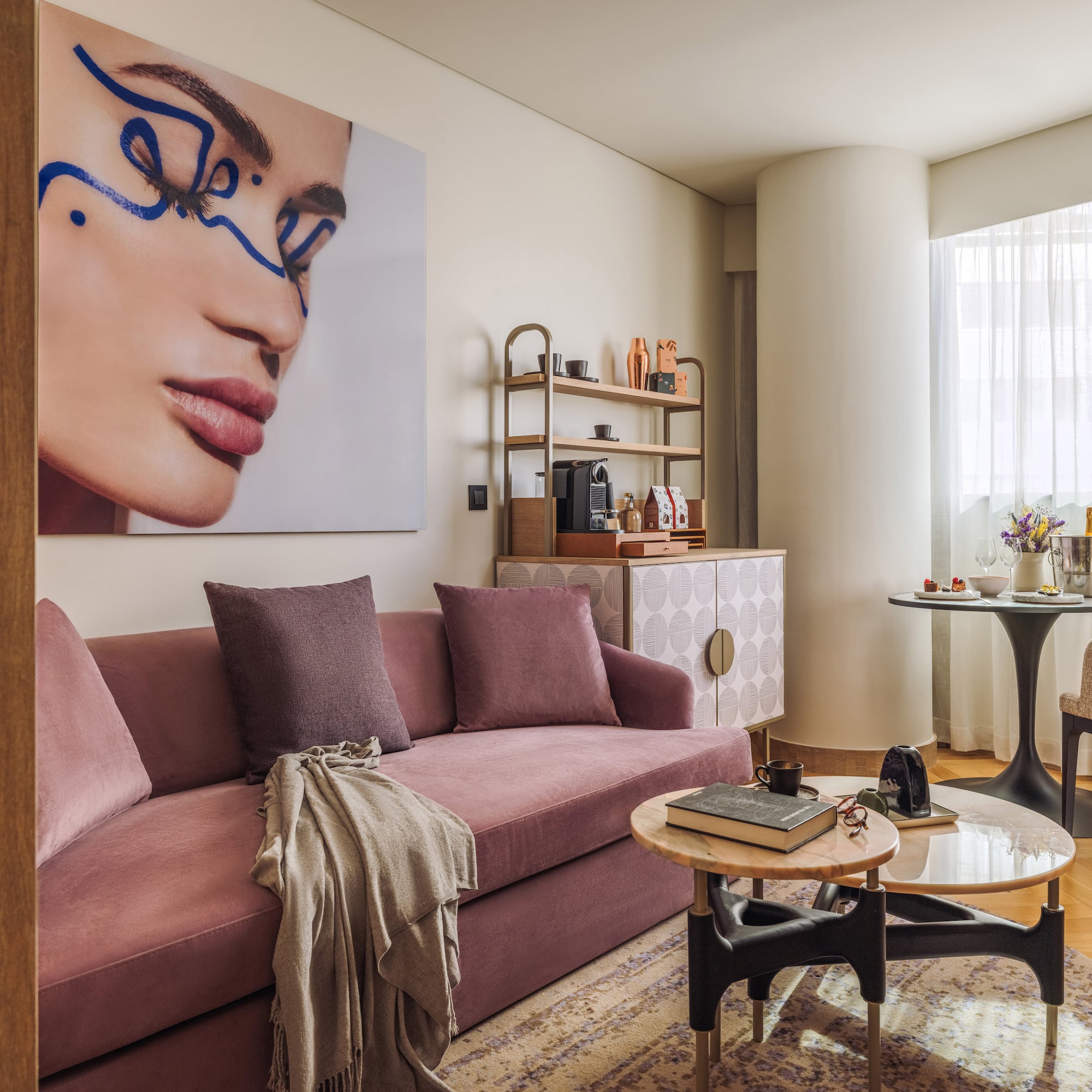 a living room with a couch and a table