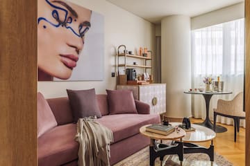 a living room with a couch and a table