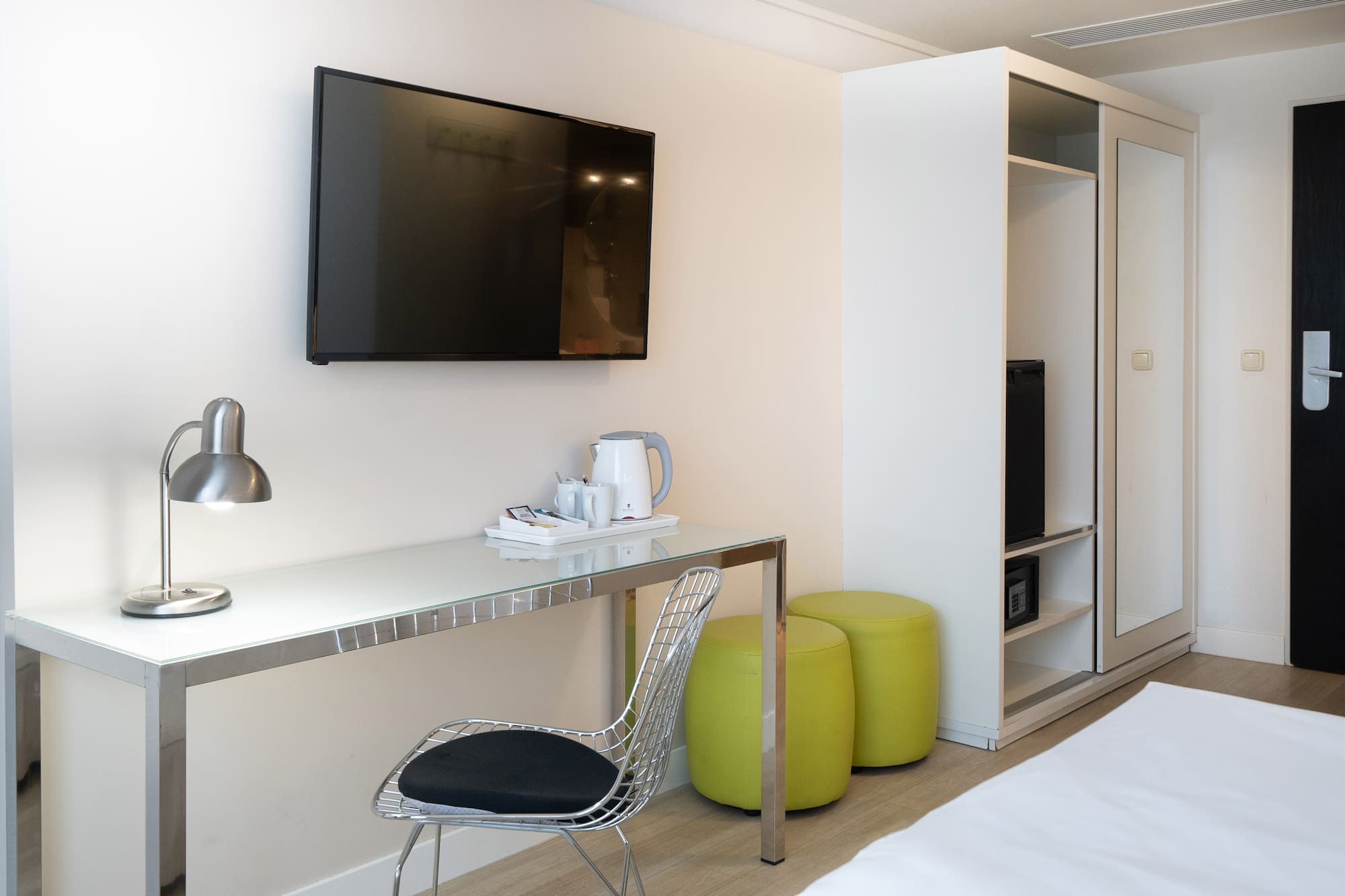 a room with a tv and a table