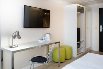 a room with a tv and a table