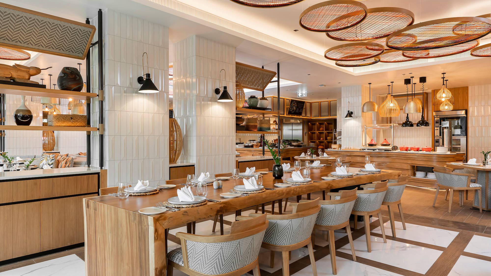 a restaurant with a long table and chairs