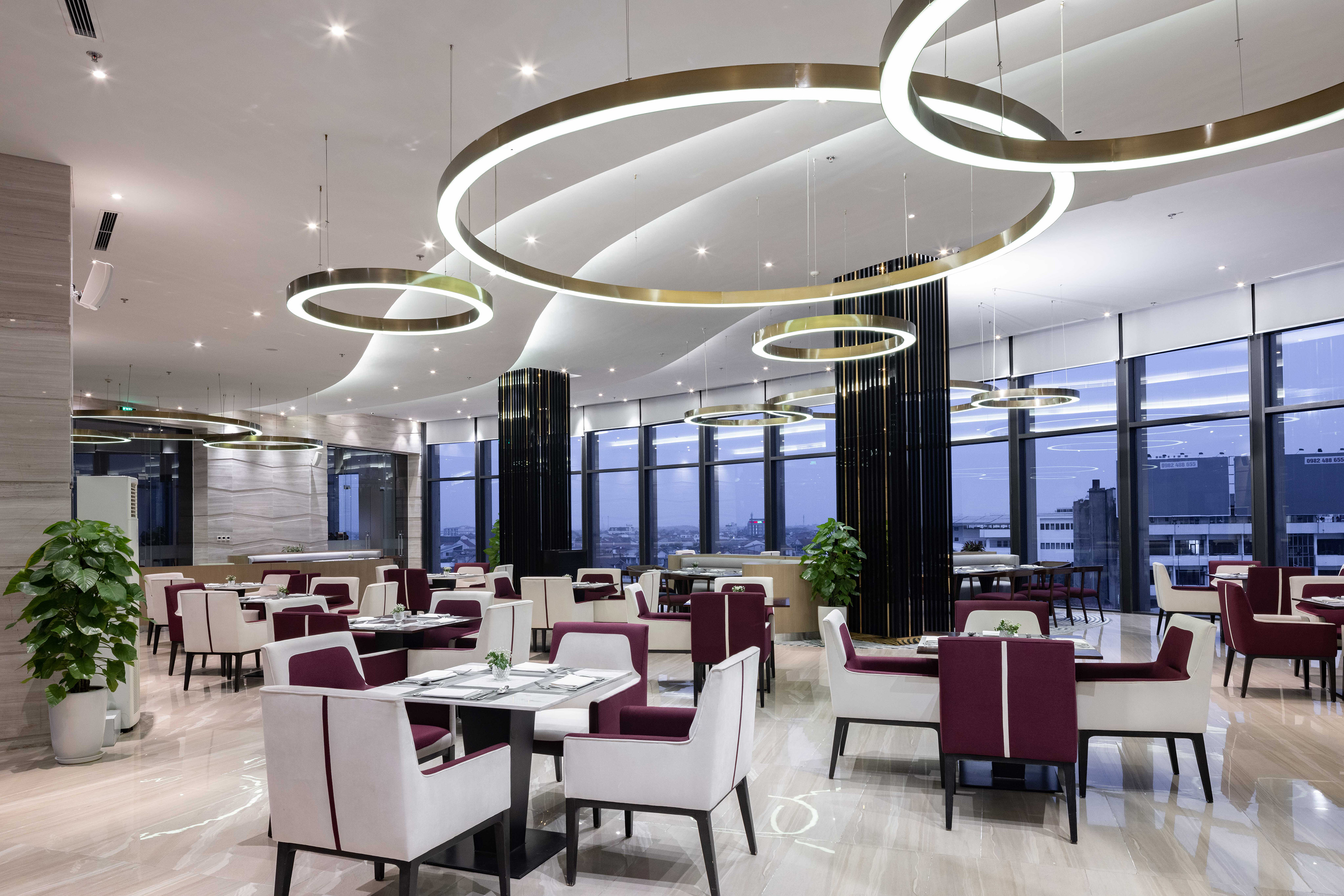 a restaurant with tables and chairs