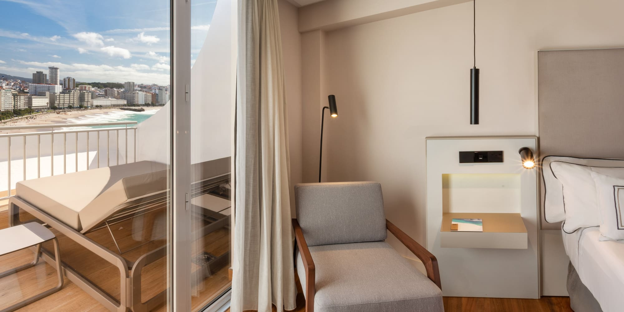 a room with a chair and a glass door