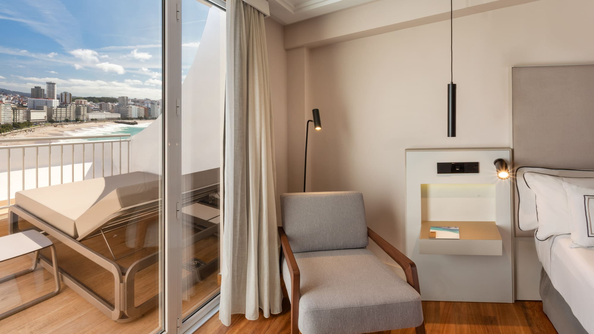 a room with a chair and a glass door