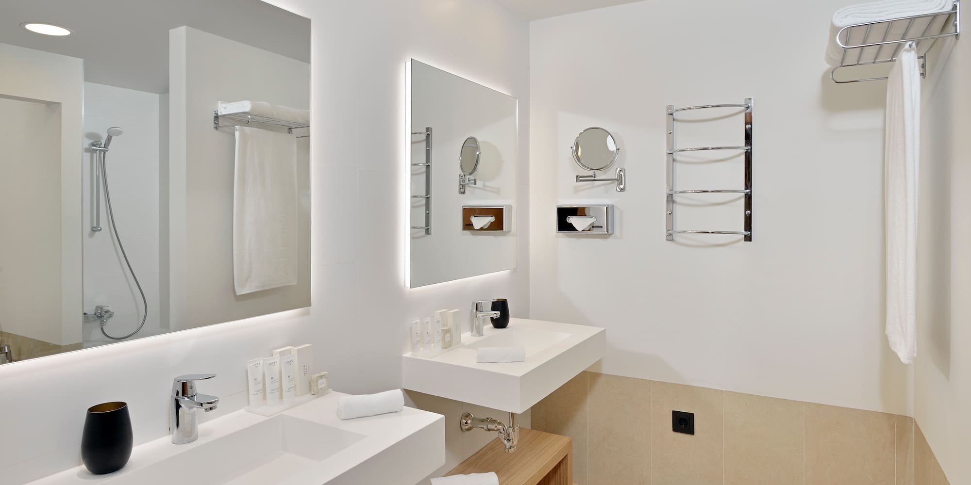 a bathroom with white walls and white countertops