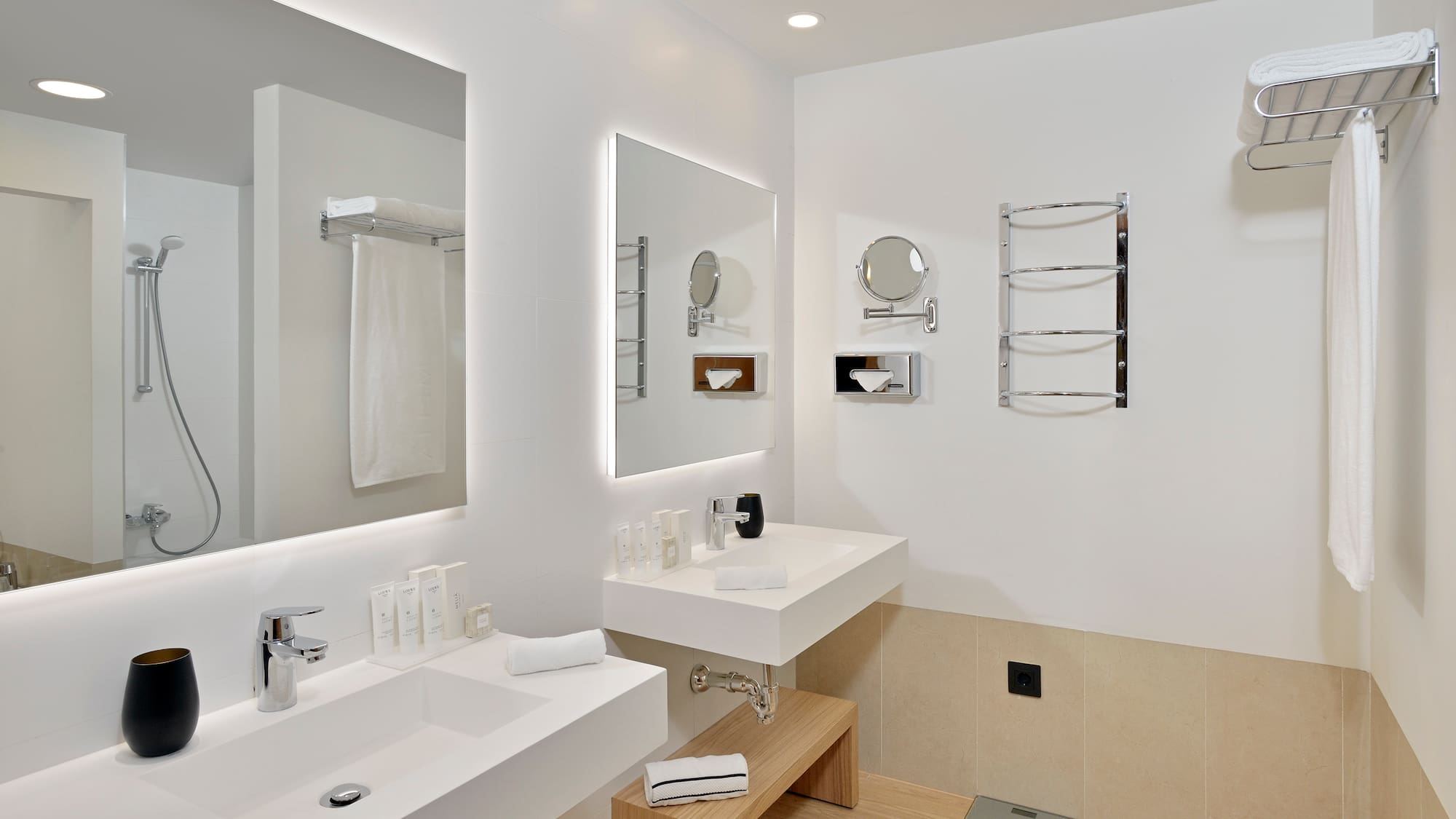 a bathroom with white walls and white countertops
