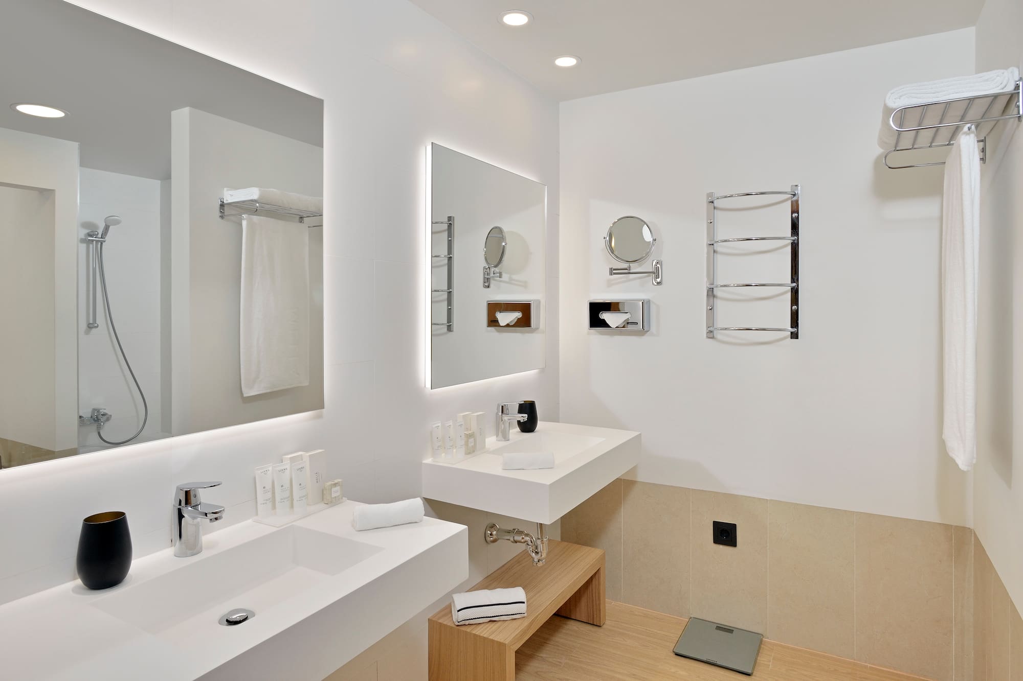 a bathroom with white walls and white countertops