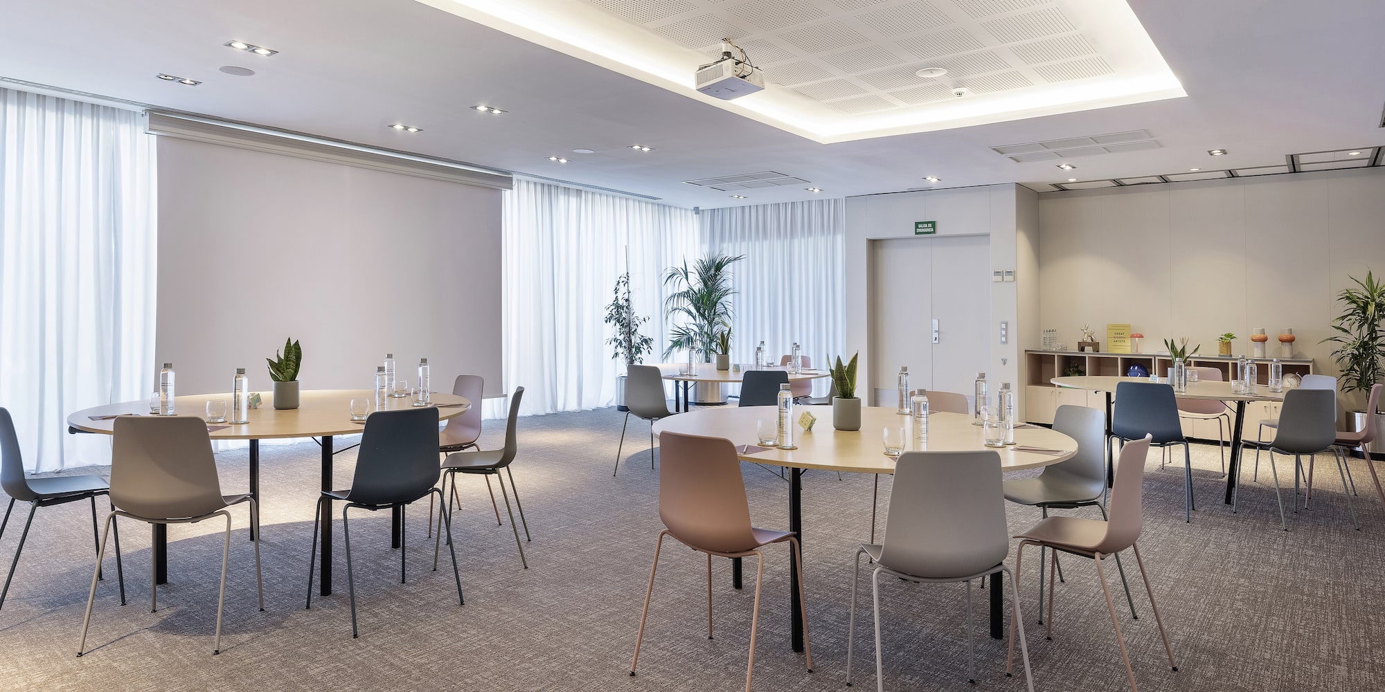 a room with tables and chairs