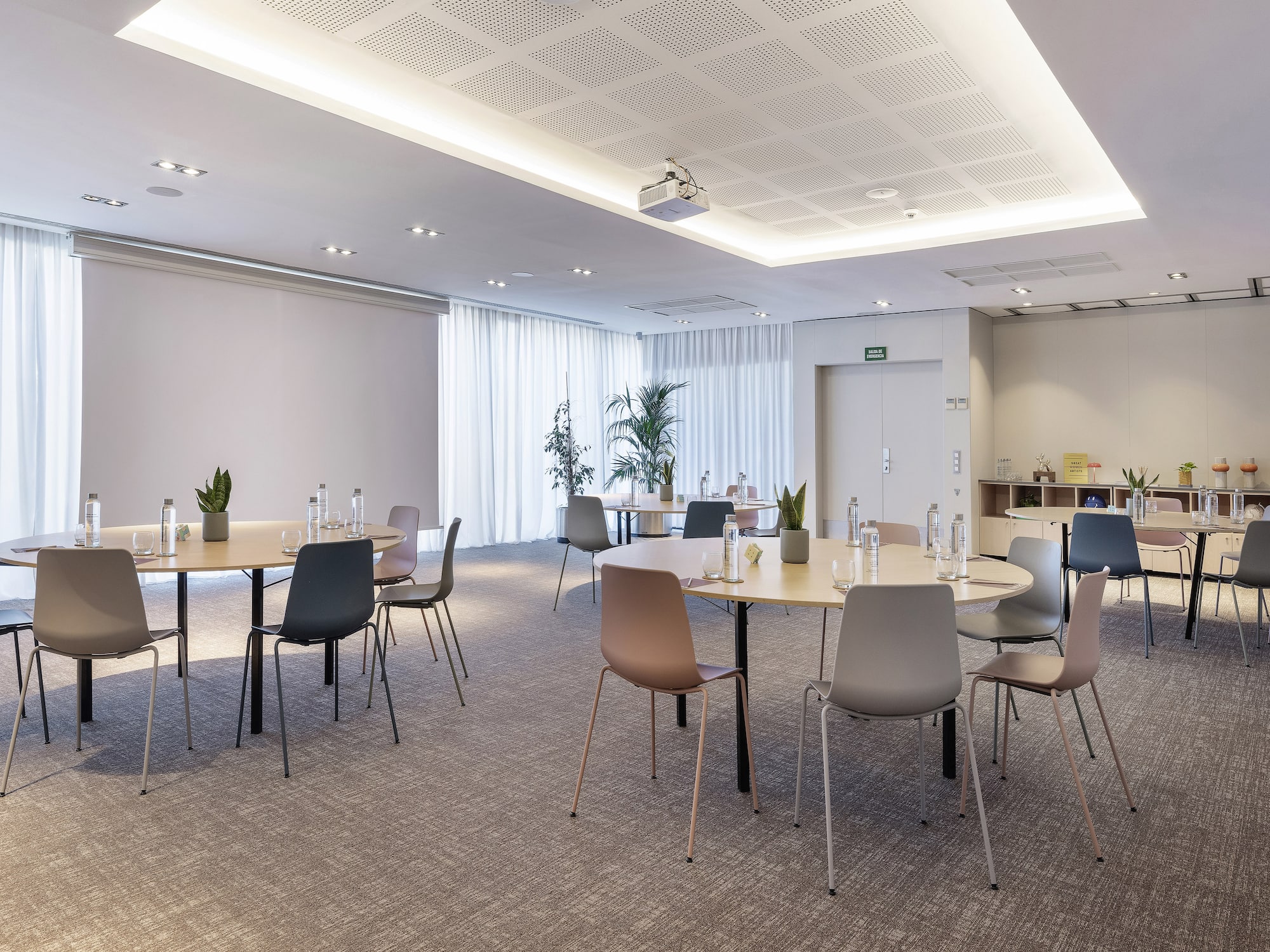 a room with tables and chairs