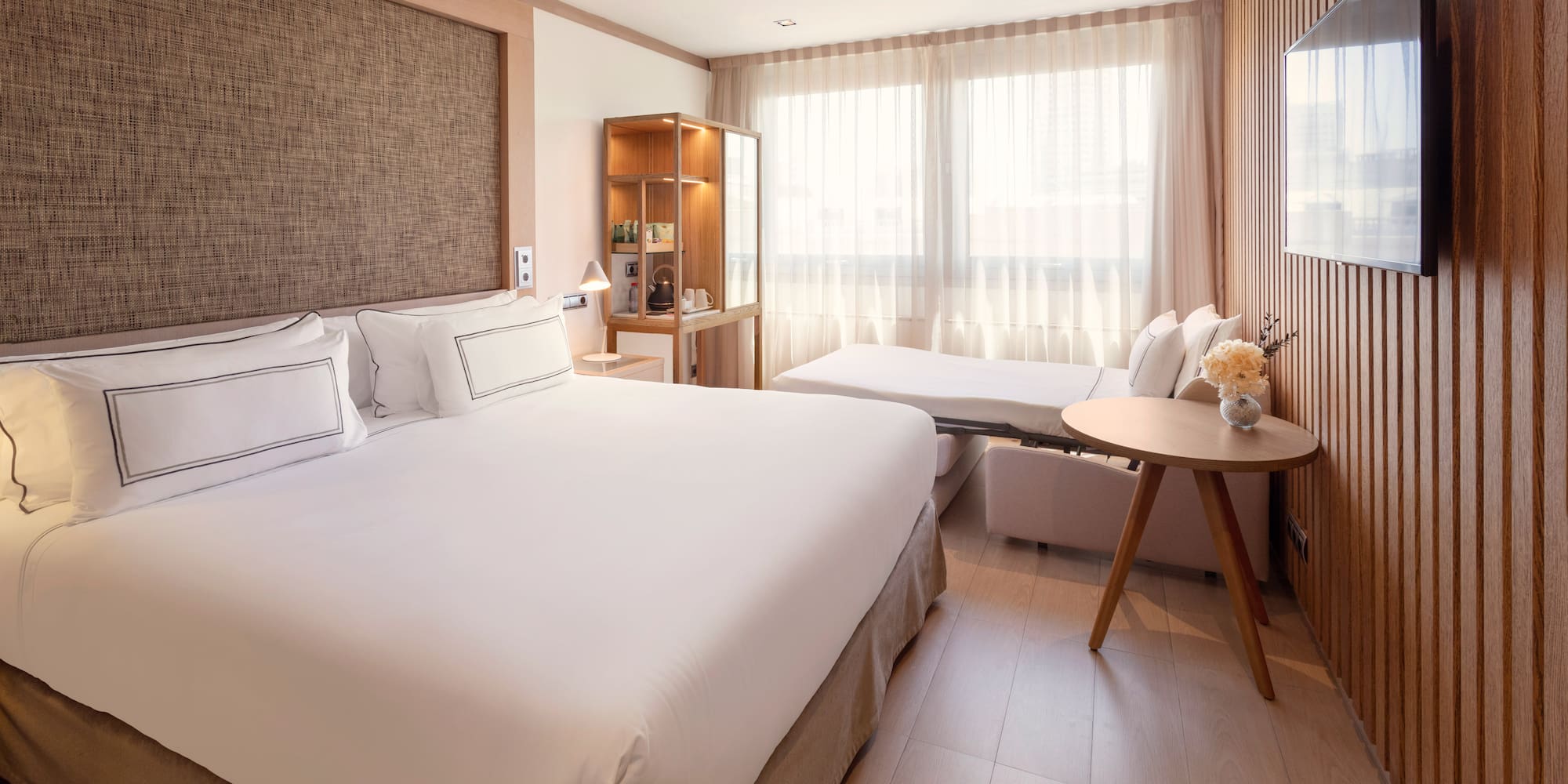 a room with a bed and a table