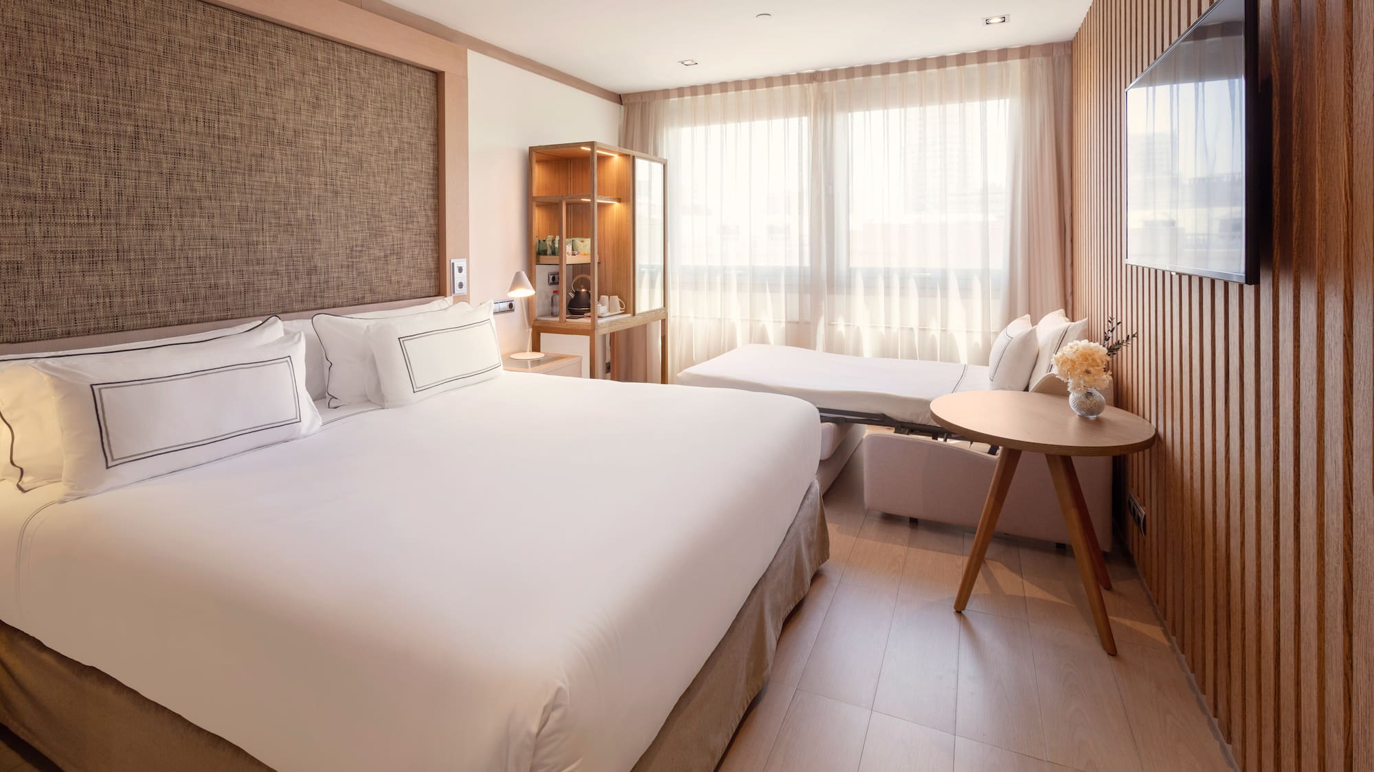 a room with a bed and a table