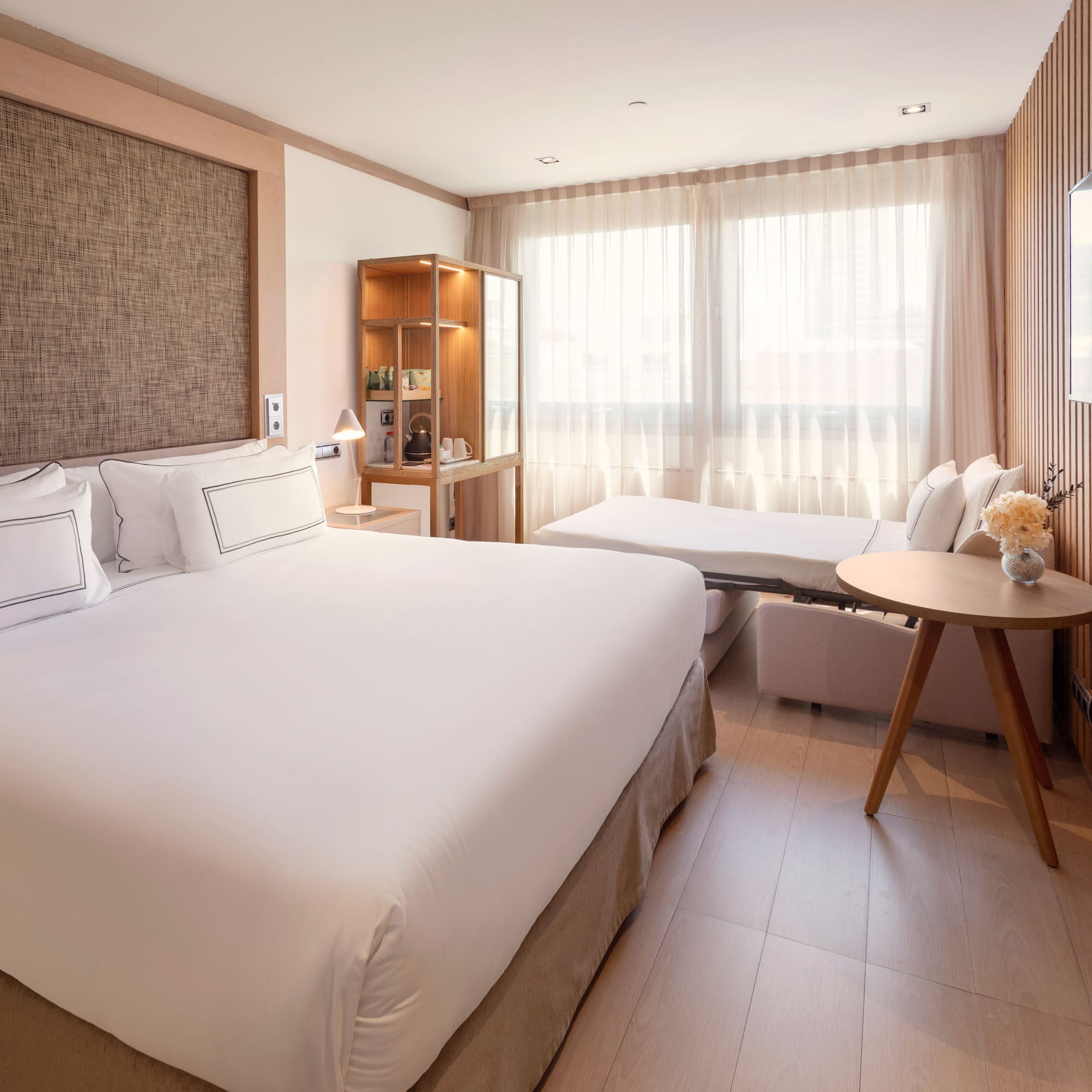 a room with a bed and a table