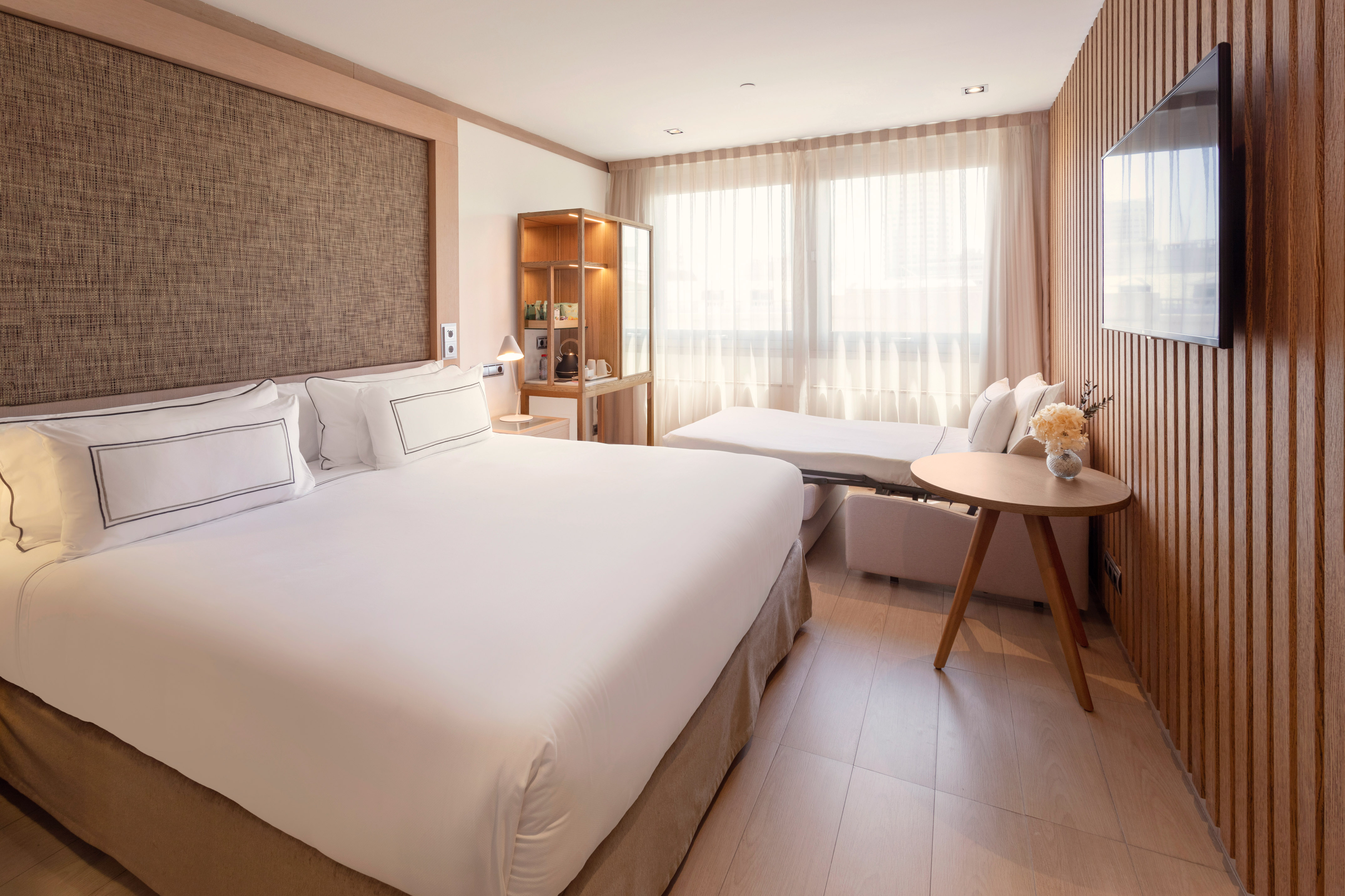 a room with a bed and a table