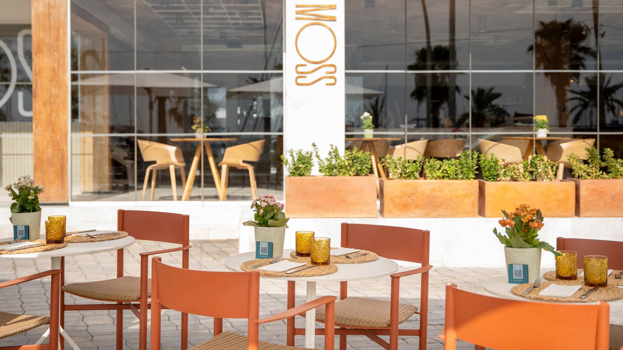 a table and chairs outside of a building