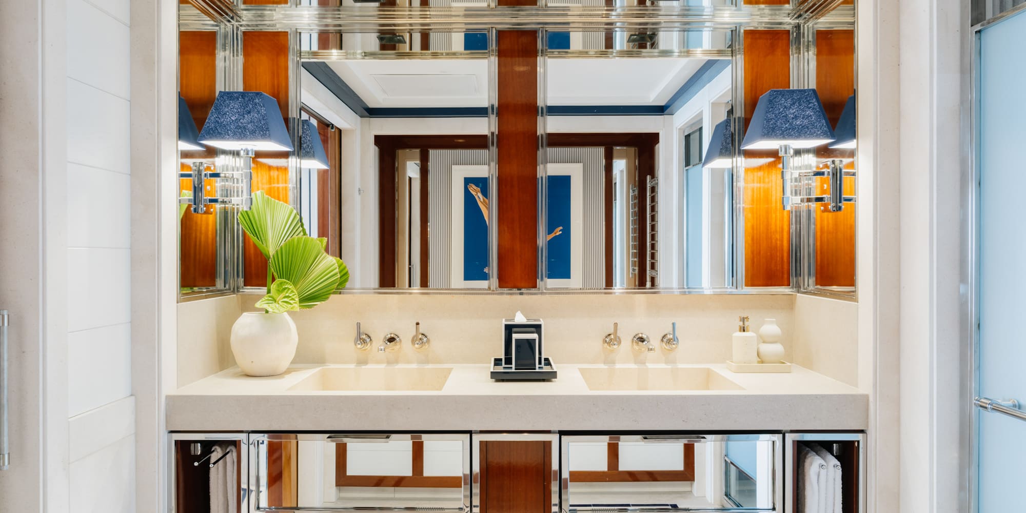 a bathroom with a mirror and sink