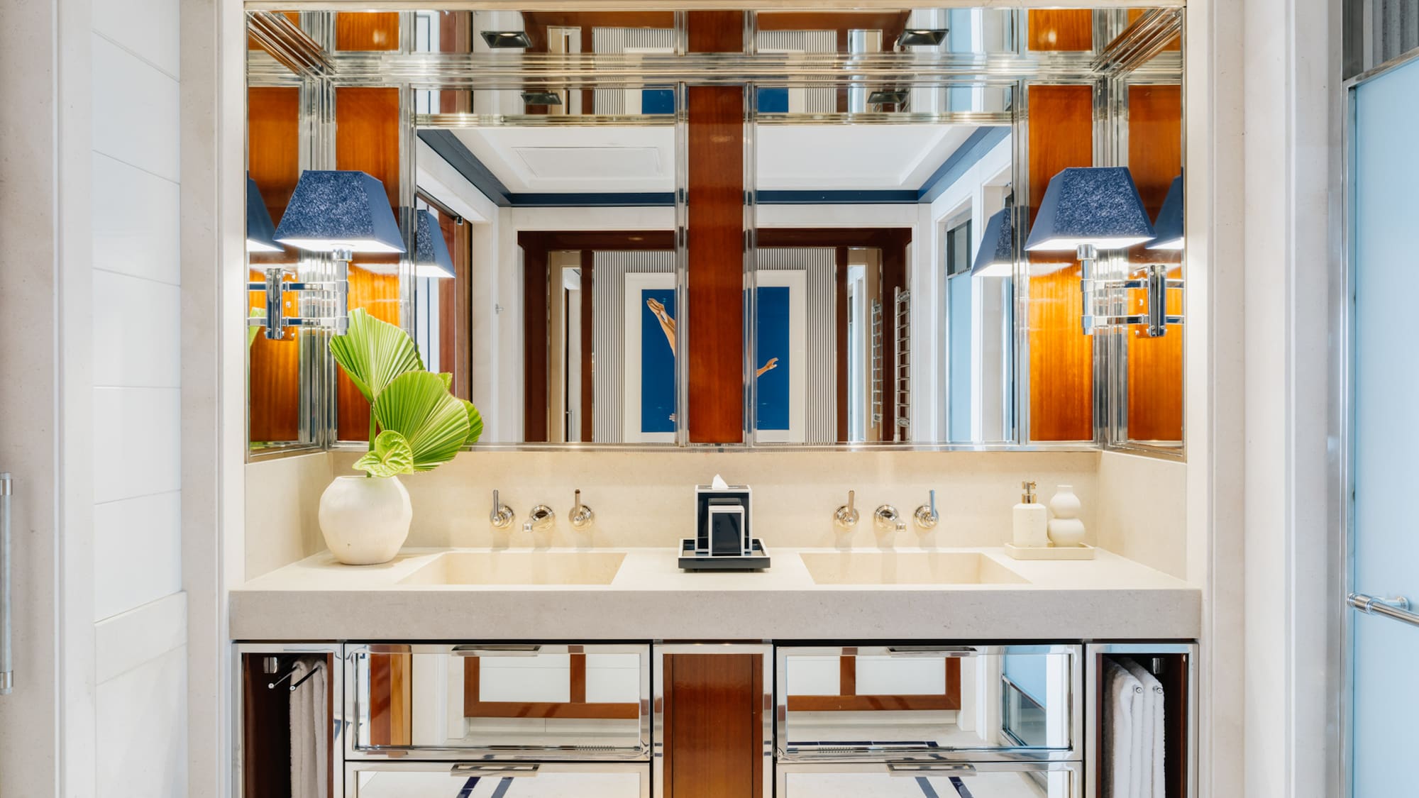 a bathroom with a mirror and sink