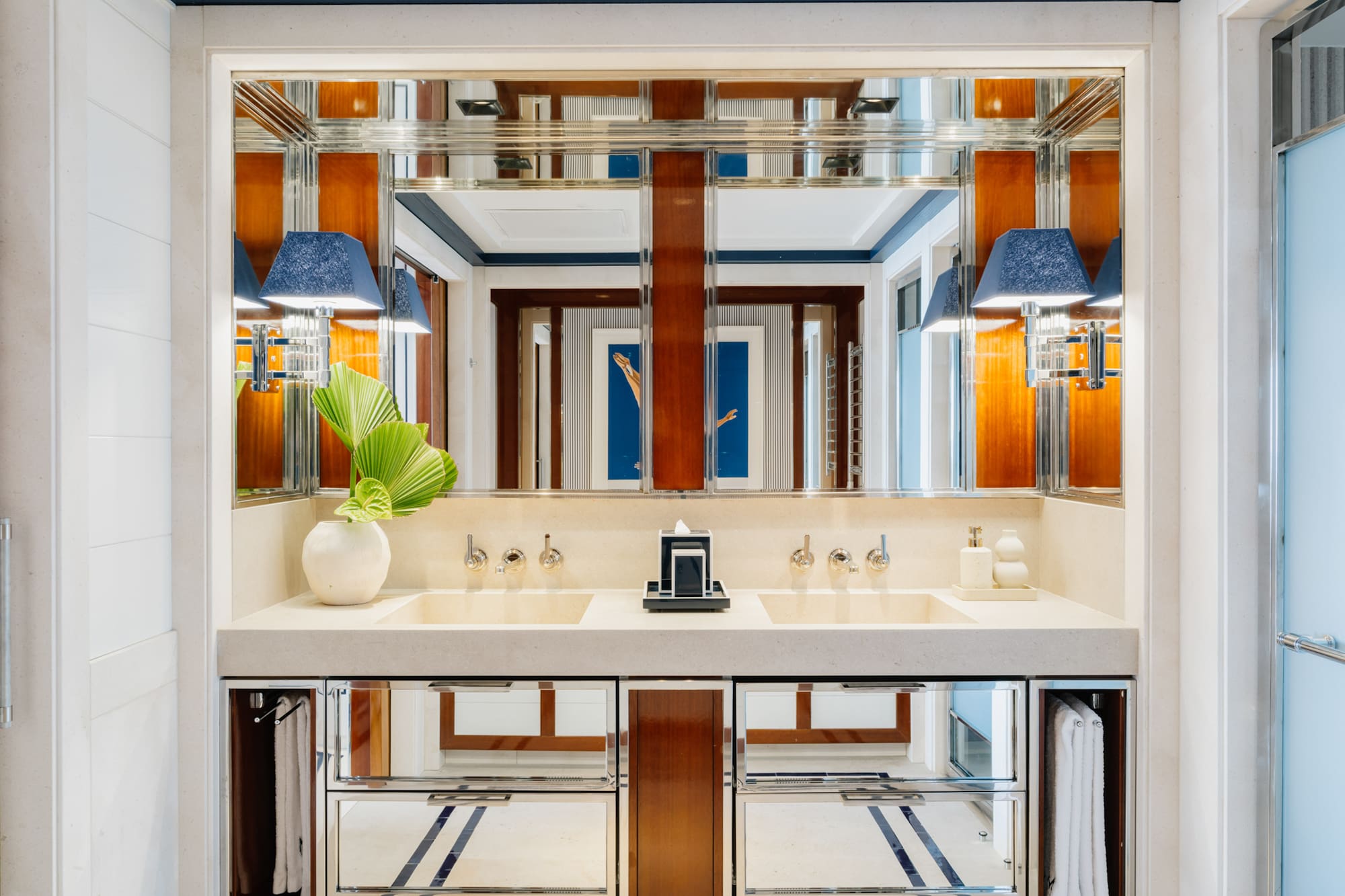 a bathroom with a mirror and sink