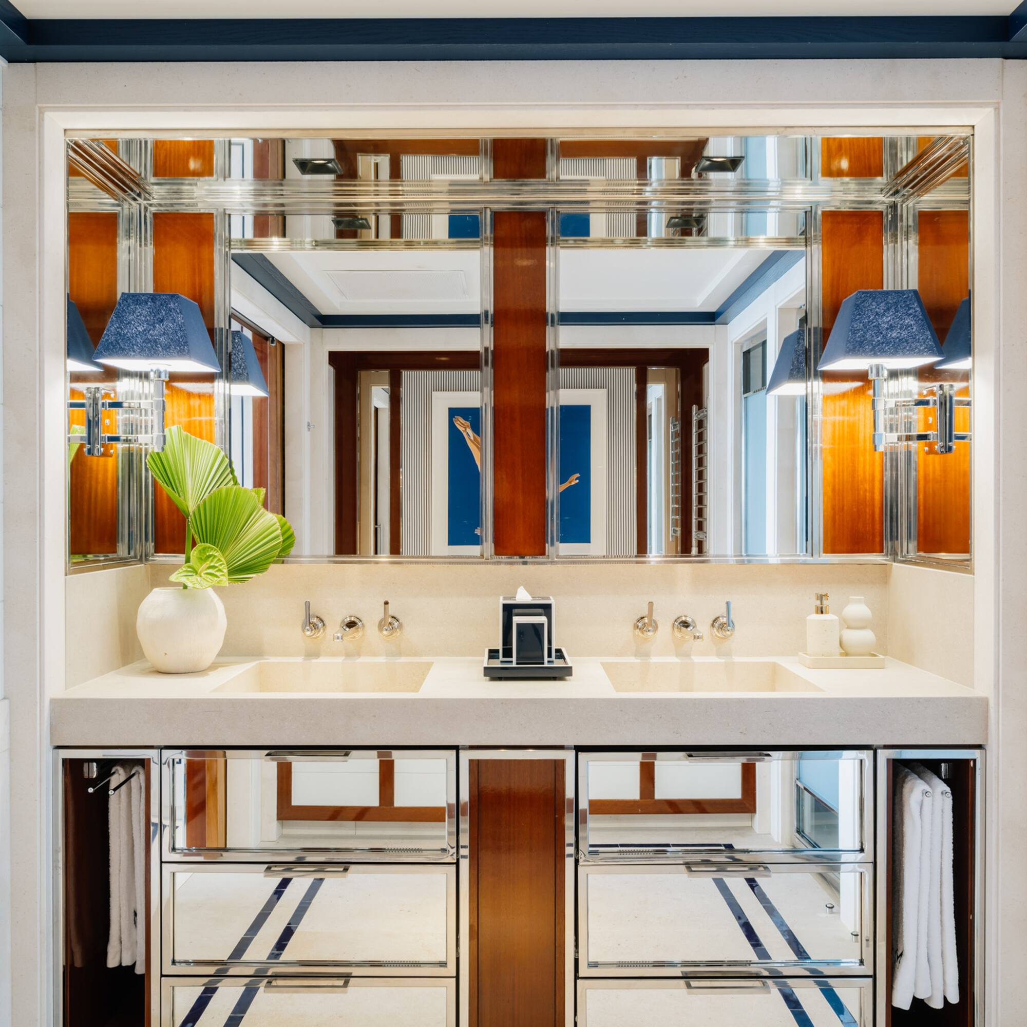 a bathroom with a mirror and sink