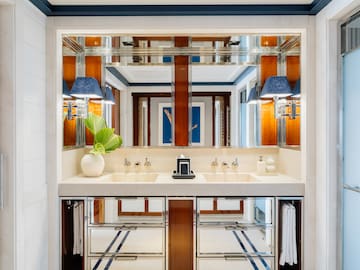 a bathroom with a mirror and sink