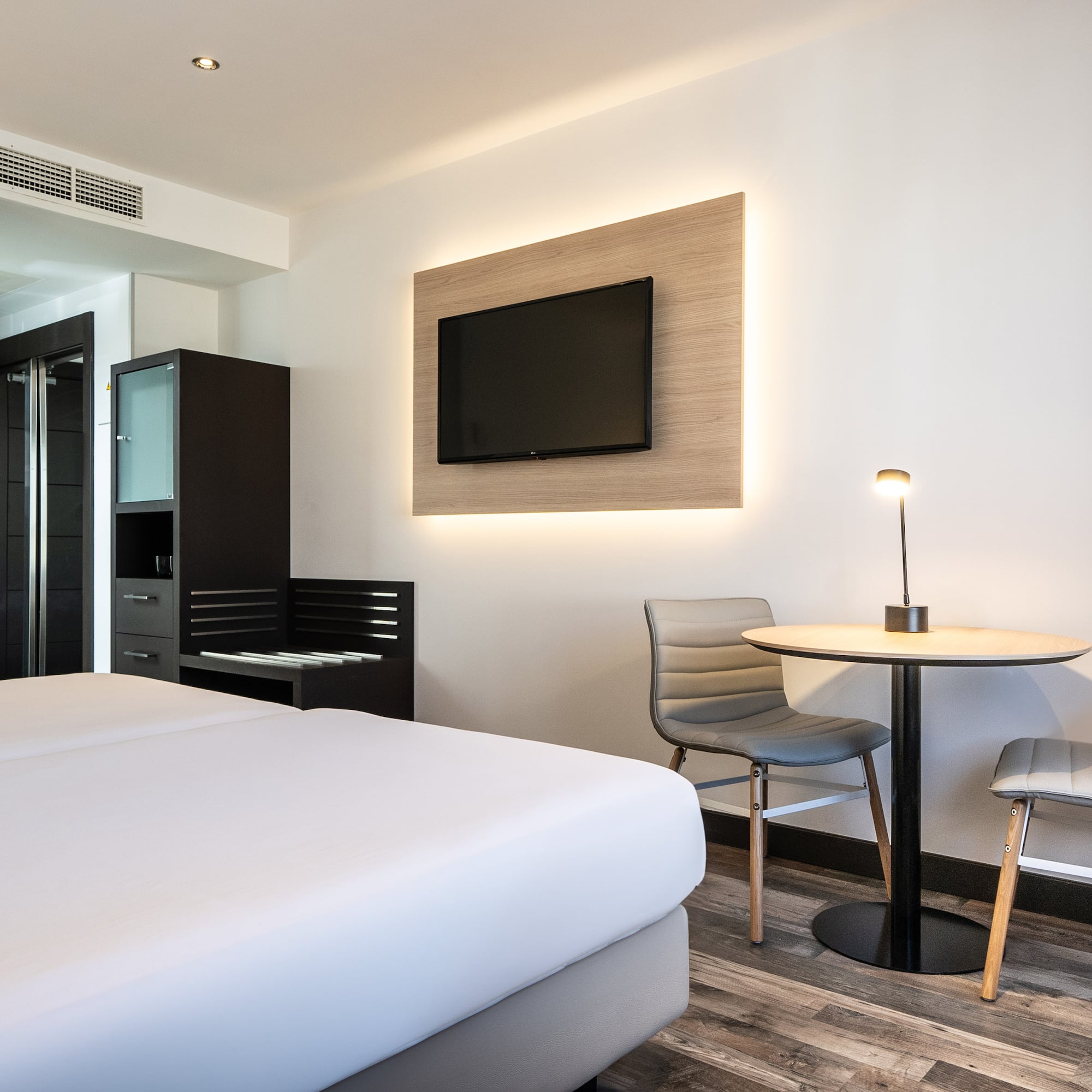 a room with a tv and a table