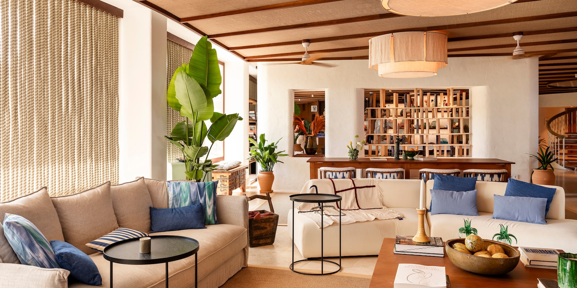 a living room with couches and a table