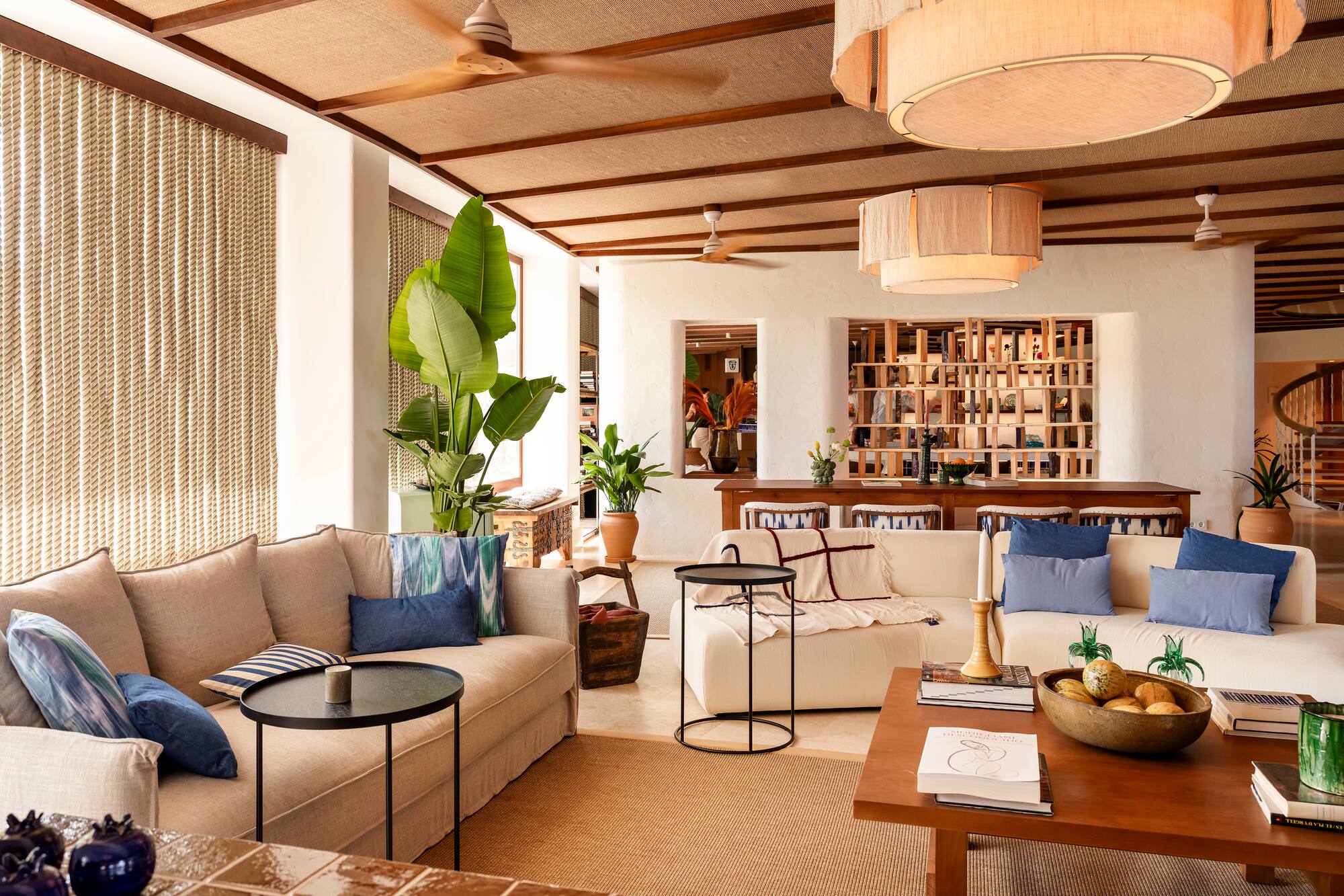 a living room with couches and a table