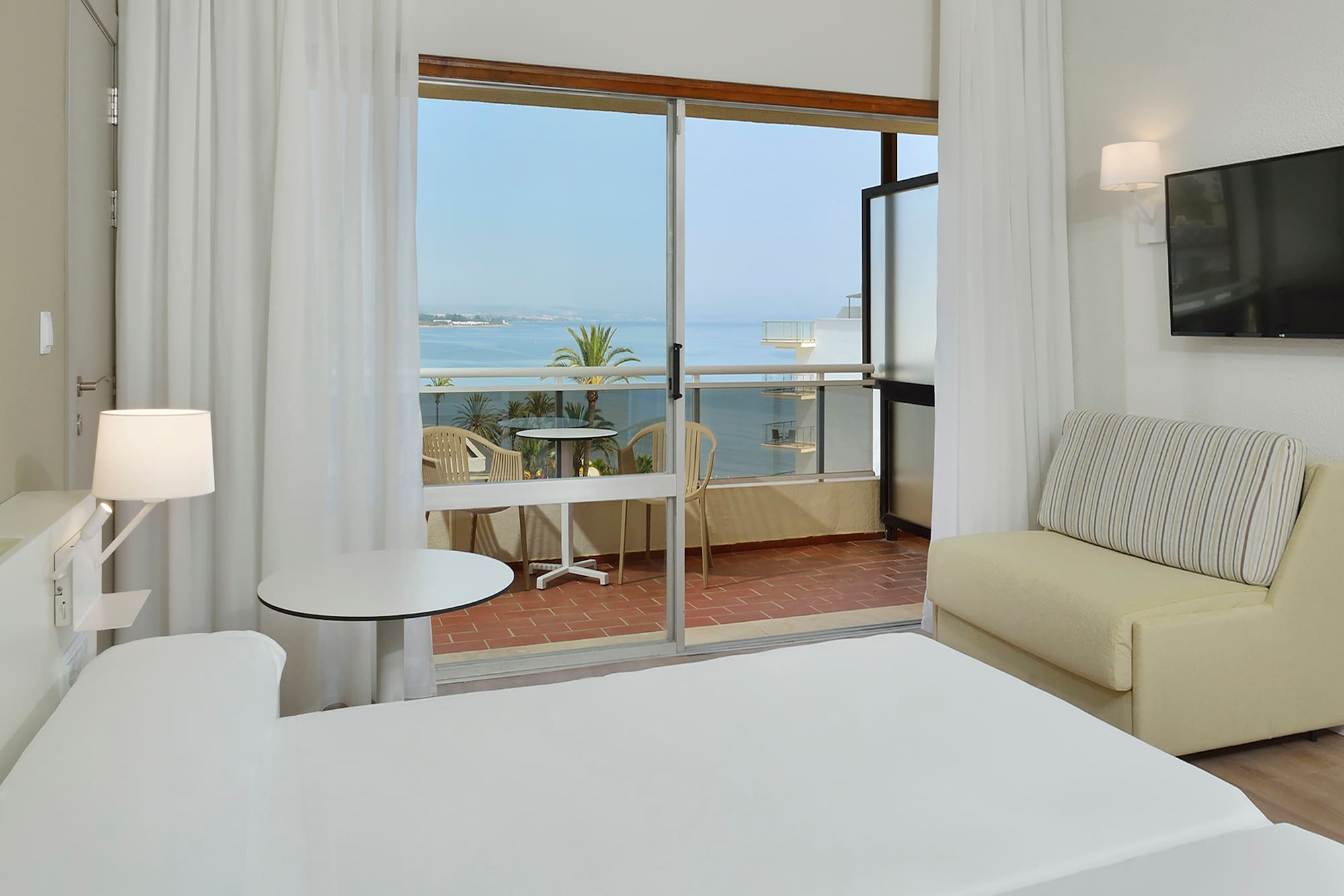 a room with a bed and a couch