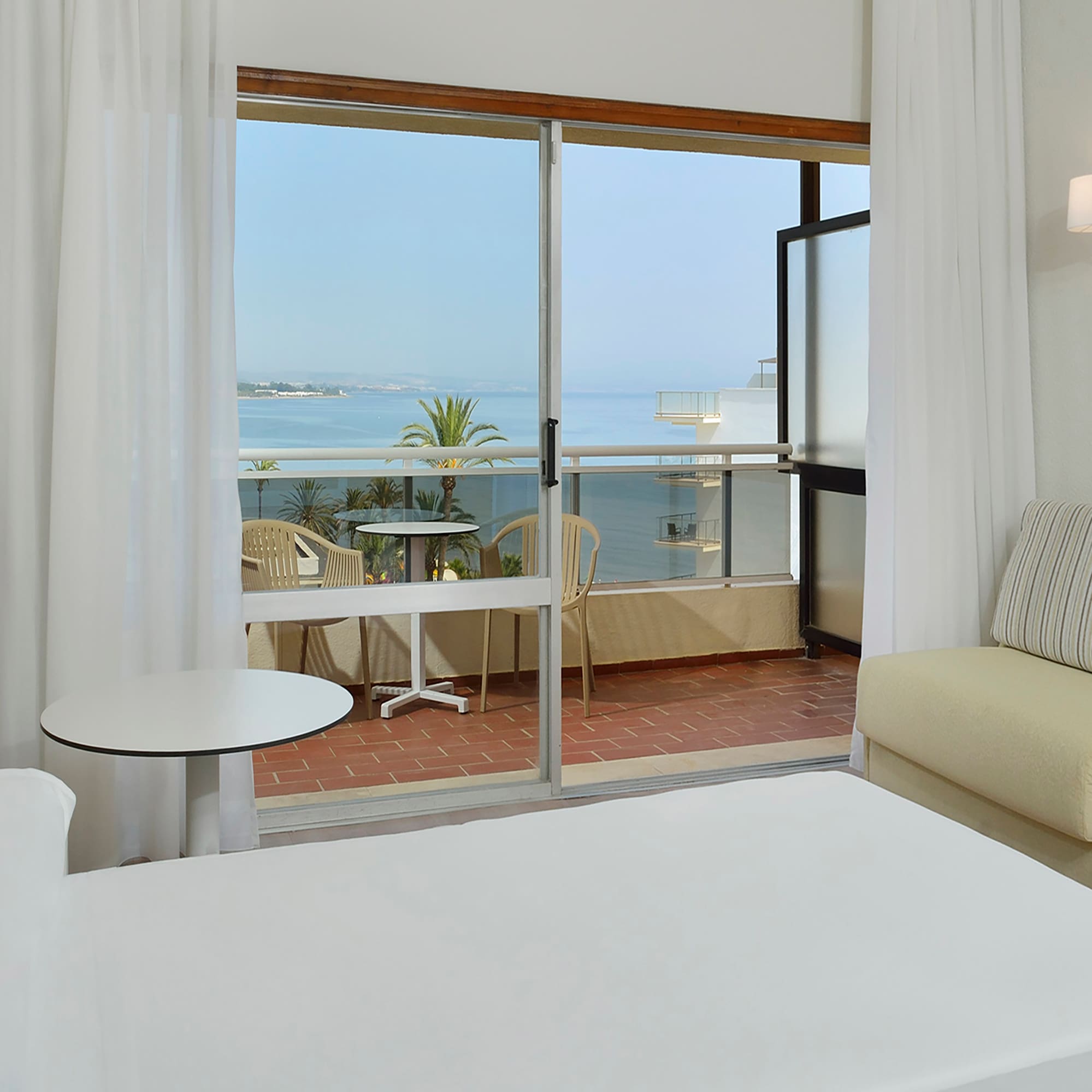 a room with a bed and a couch