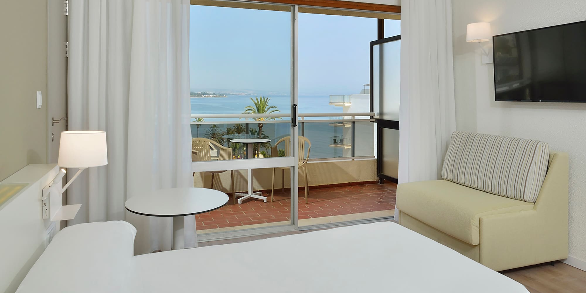 a room with a bed and a couch