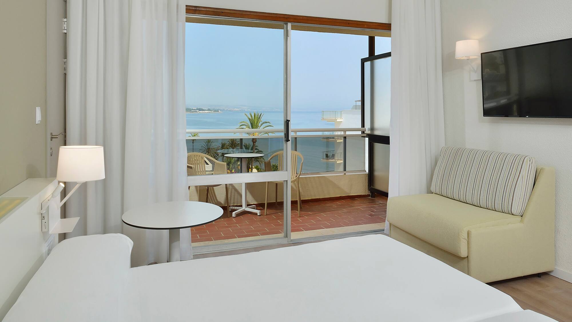 a room with a bed and a couch