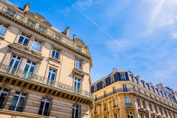 a group of buildings with balconies