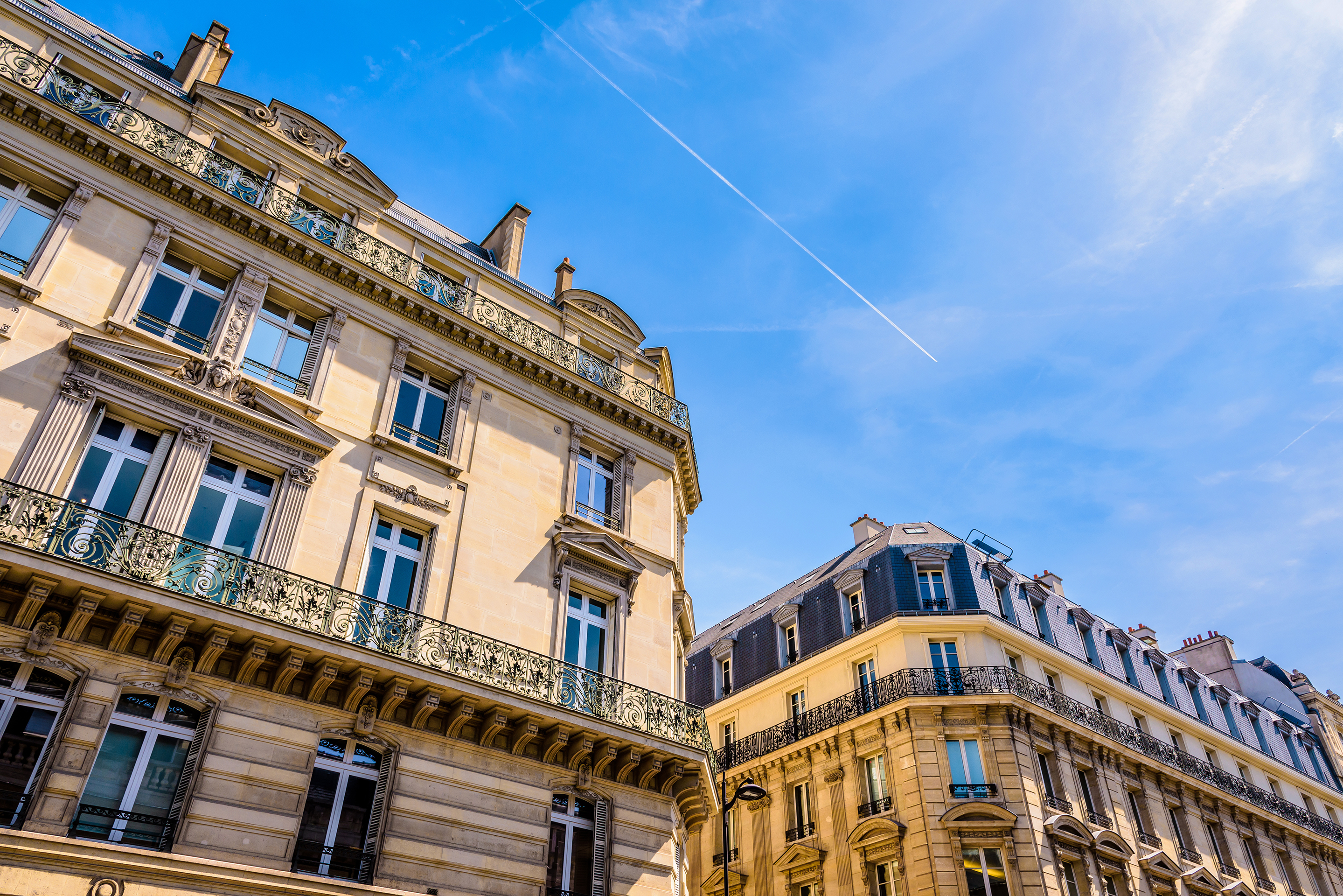 a group of buildings with balconies