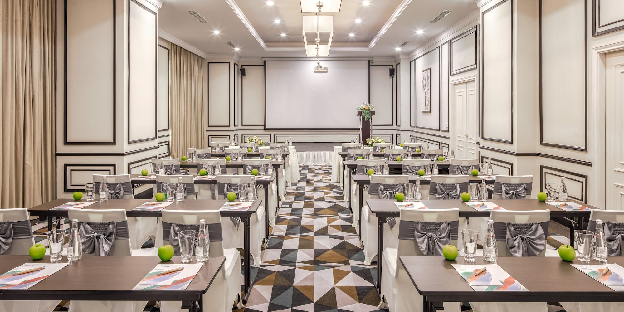 a room with tables and chairs