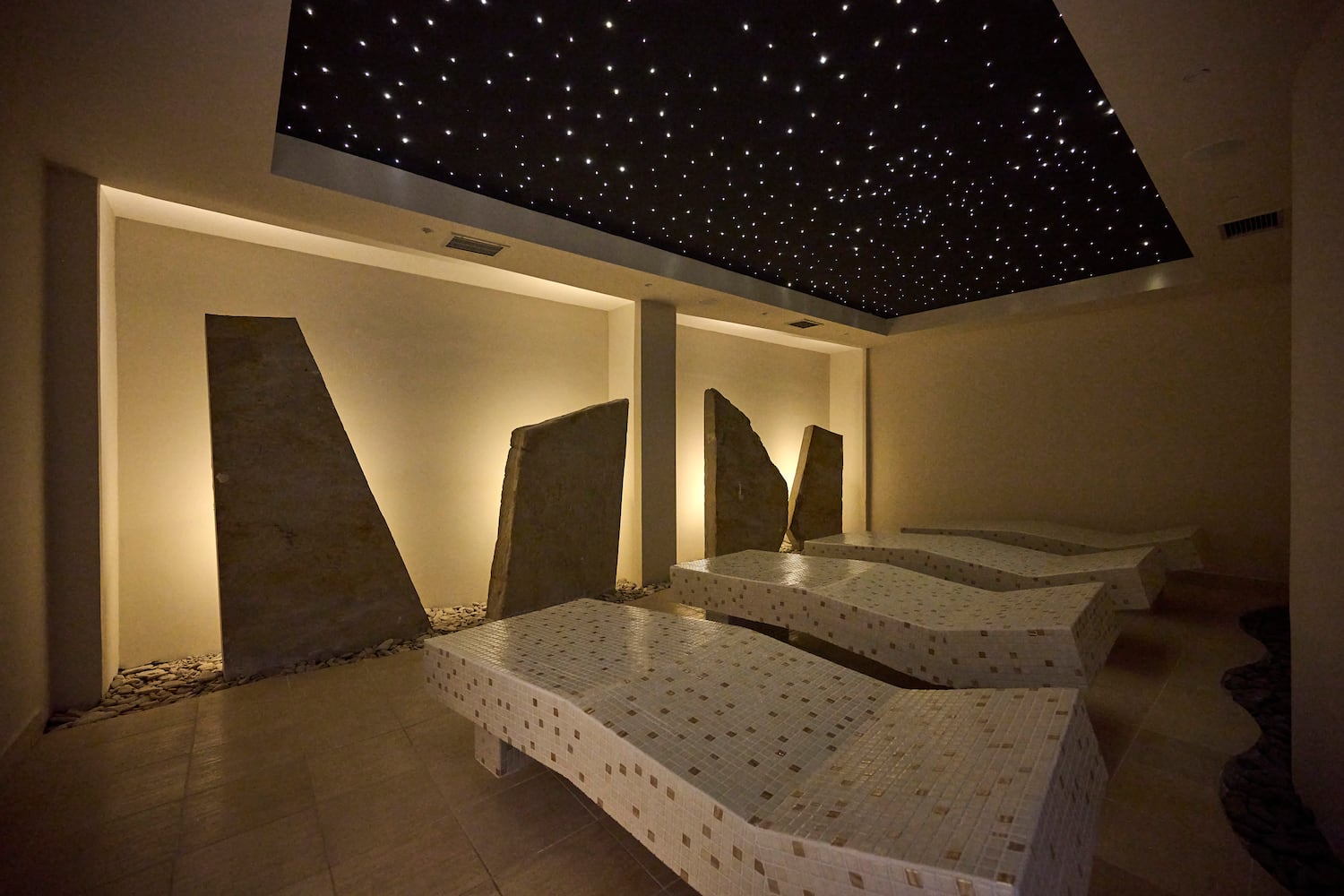 a group of beds in a room