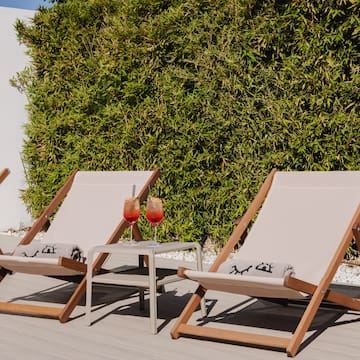 a group of chairs on a patio